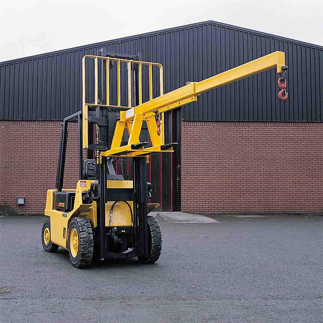 Fork mounted telescopic jib for machinery lifting