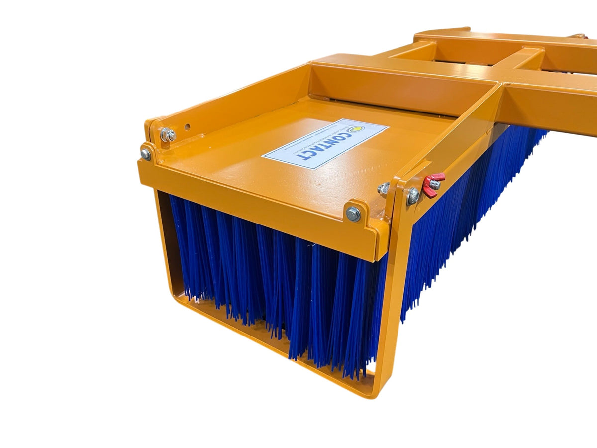 Close-up of heavy duty forklift sweeper bristles and steel shroud