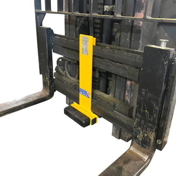 Carriage mounted pallet stop for forklifts