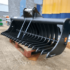 Land rake in use on an excavator