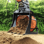 Screening bucket sorting soil and rubble