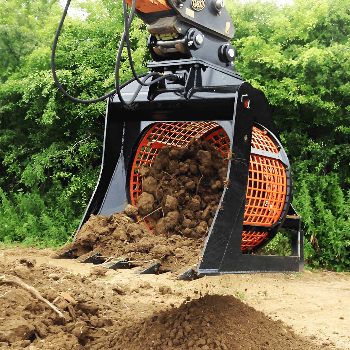 Screening bucket sorting soil and rubble
